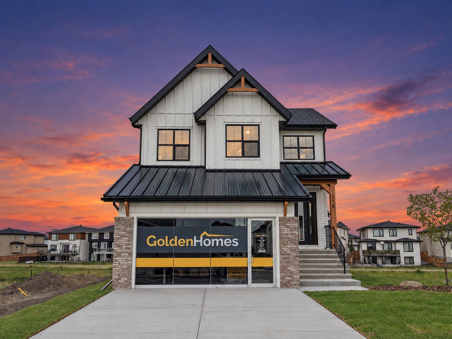 Golden Homes house in Kinniburgh South at dusk with lights on